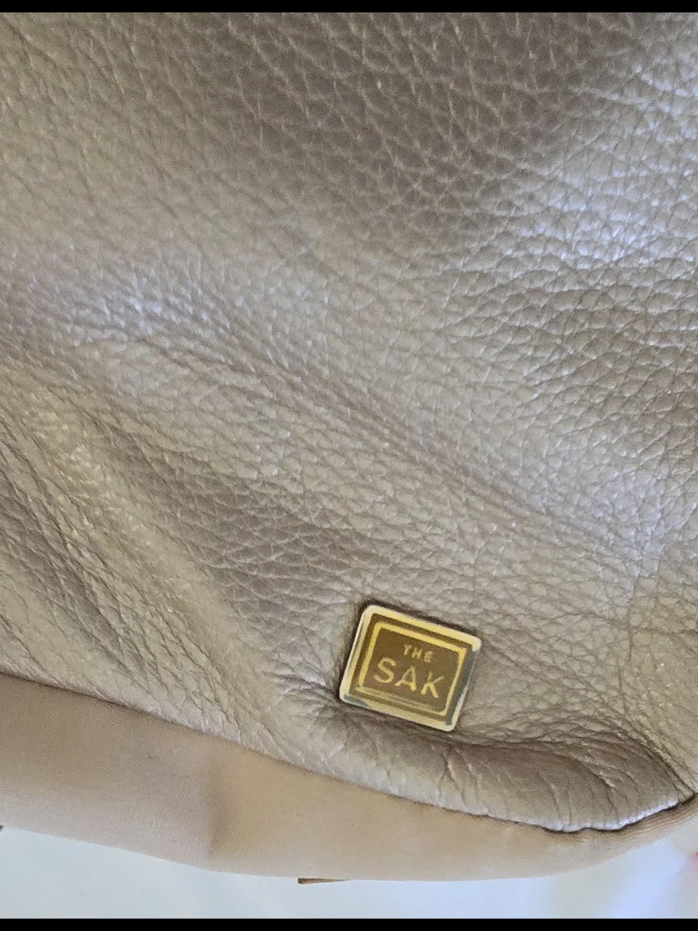 The SAK Taupe Pebbled Leather Bag  Medium Shoulder Purse Pattern Interior